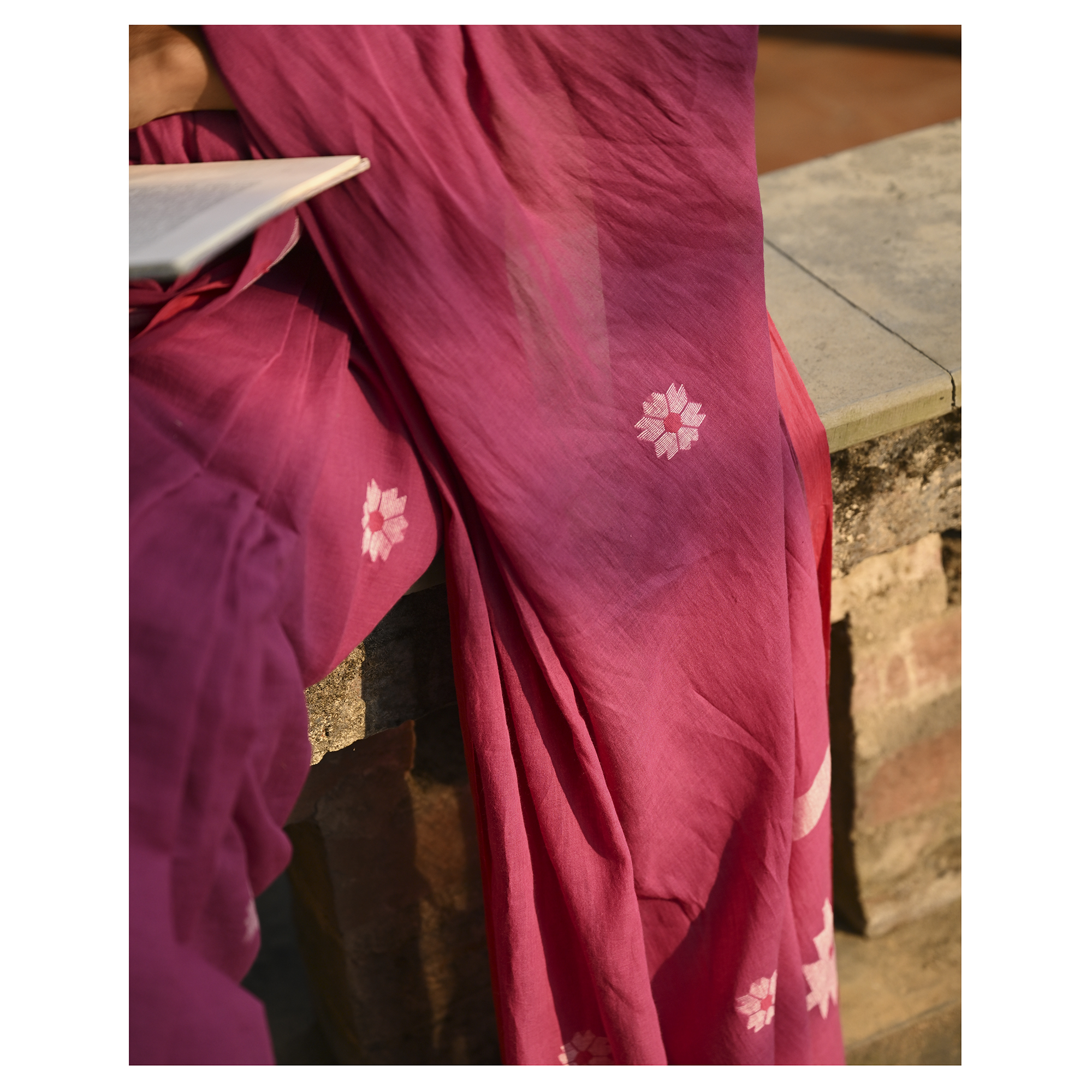 Model wearing the Rose Pink Buti Jamdani Saree, a handwoven vivid rose pink with soft white motifs Jamdani saree with airy white butis across an open field and lightly detailed pallu that keeps the drape airy.